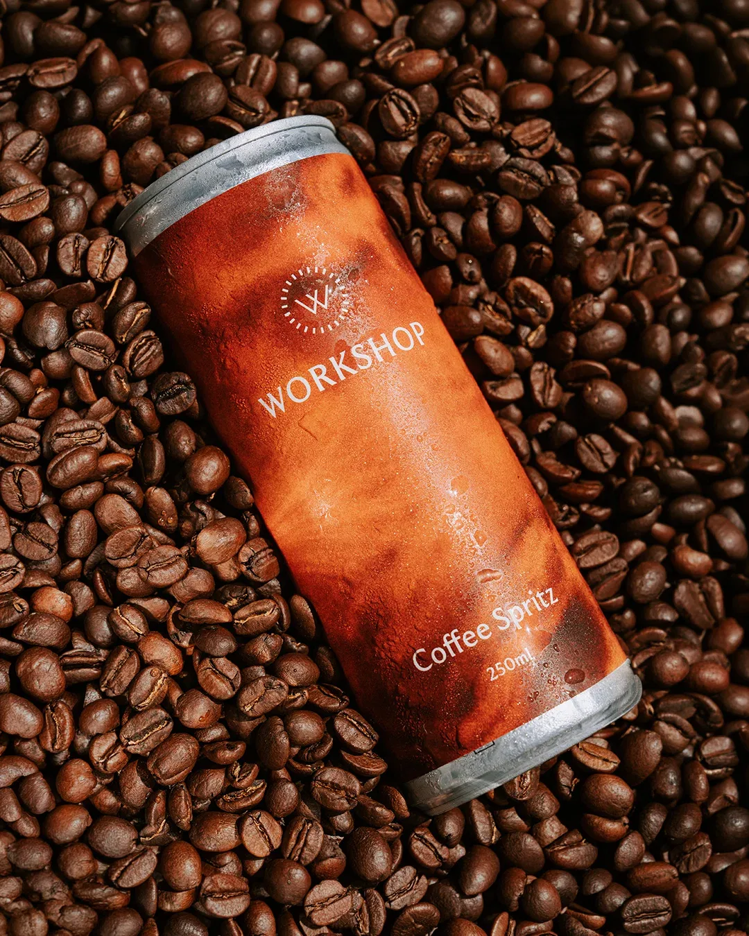 Workshop Coffee can resting on roasted beans