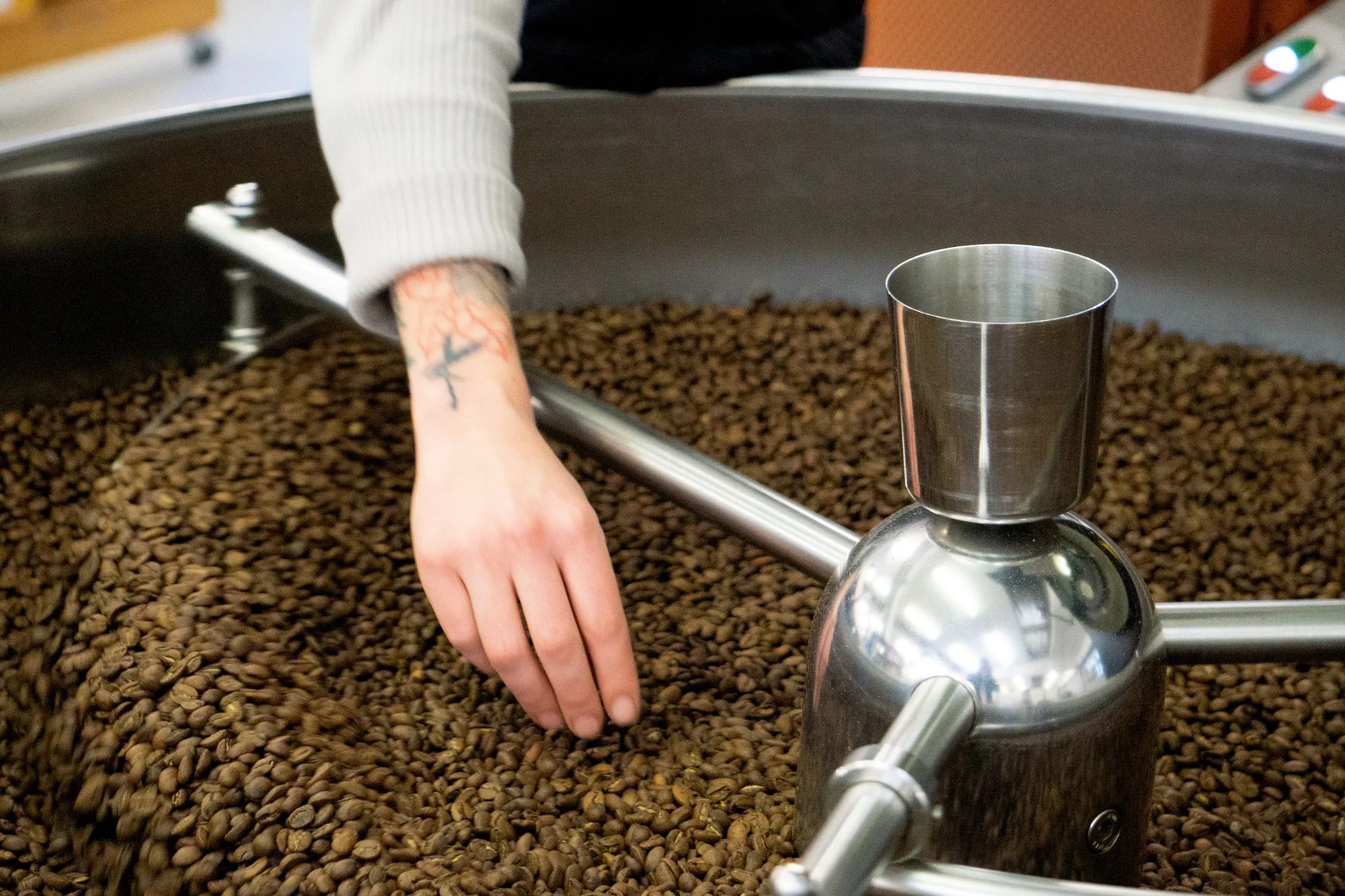 Workshop Coffee — checking a roast
